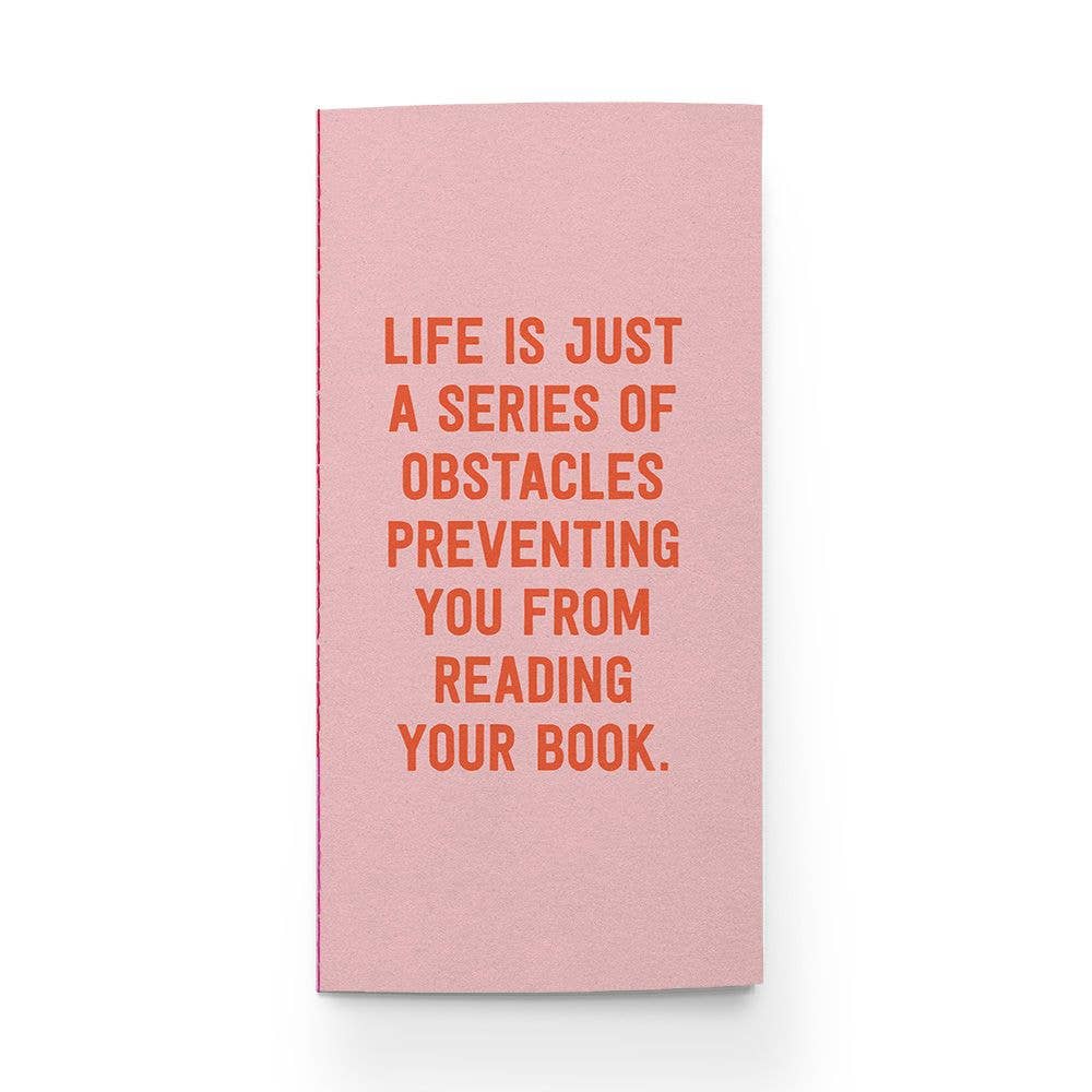 Avid Reader Traveler Notebook by Pipsticks with motivational quote on pink cover, perfect for journaling; available at stationery store.