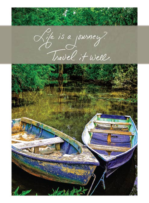 Alt Tag: Scenic retirement greeting card with two boats, lush greenery, and 'Life is a journey. Travel it well.' text, from stationery store.