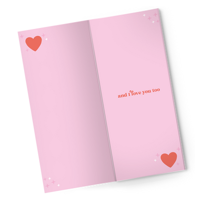 Open Chocolate Greeting Card with pink cover reading 'and I love you too', perfect for Valentine's Day, available at stationery store.