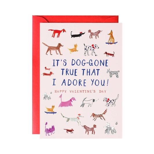 Valentine's Day greeting card with dog illustrations and "It's Doggone True That I Adore You" message from a NYC stationery store.