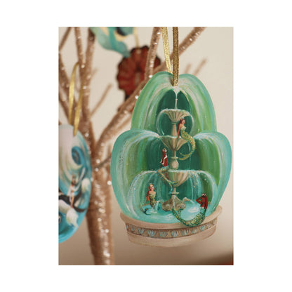 Mermaid Fountain Paper Ornament with gold ribbon, glitter embellishments, and die cut design, perfect for stationery store displays.