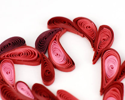 Quilled paper heart design from A Toast to Love Greeting Card, perfect for gifting. Available at stationery store.