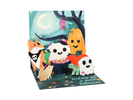 Woodland Halloween Pop-Up Card with forest creatures, pumpkins, and candy; ideal for stationery stores. Message: Wishing you a sweet Halloween.