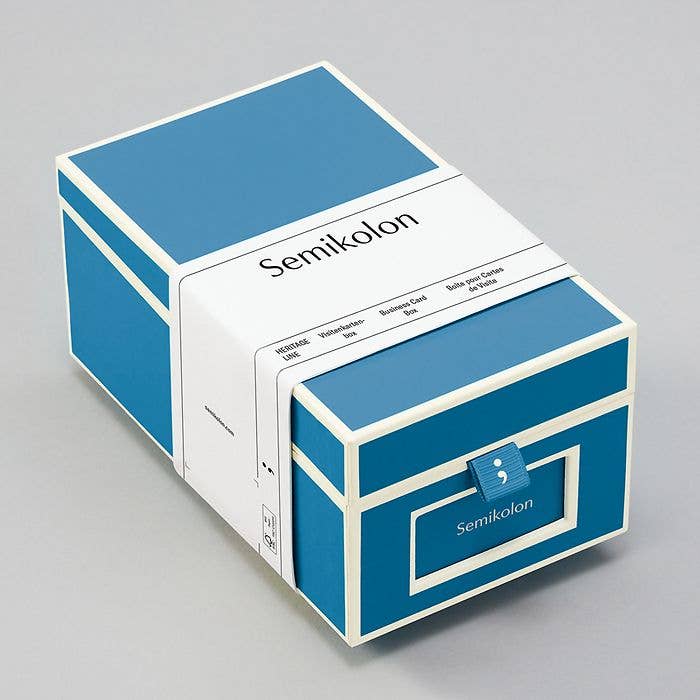 Heritage Line Semikolon Business Card Box for stationery store, stylish design with blue cardboard, holds 480 cards, includes index cards.