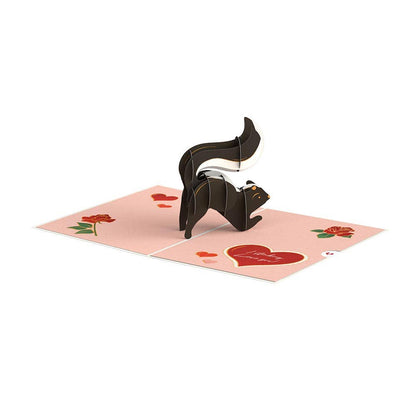 Stinking Love You Skunk Valentine 5''x7'' pop-up card with a skunk design from a stationery store.