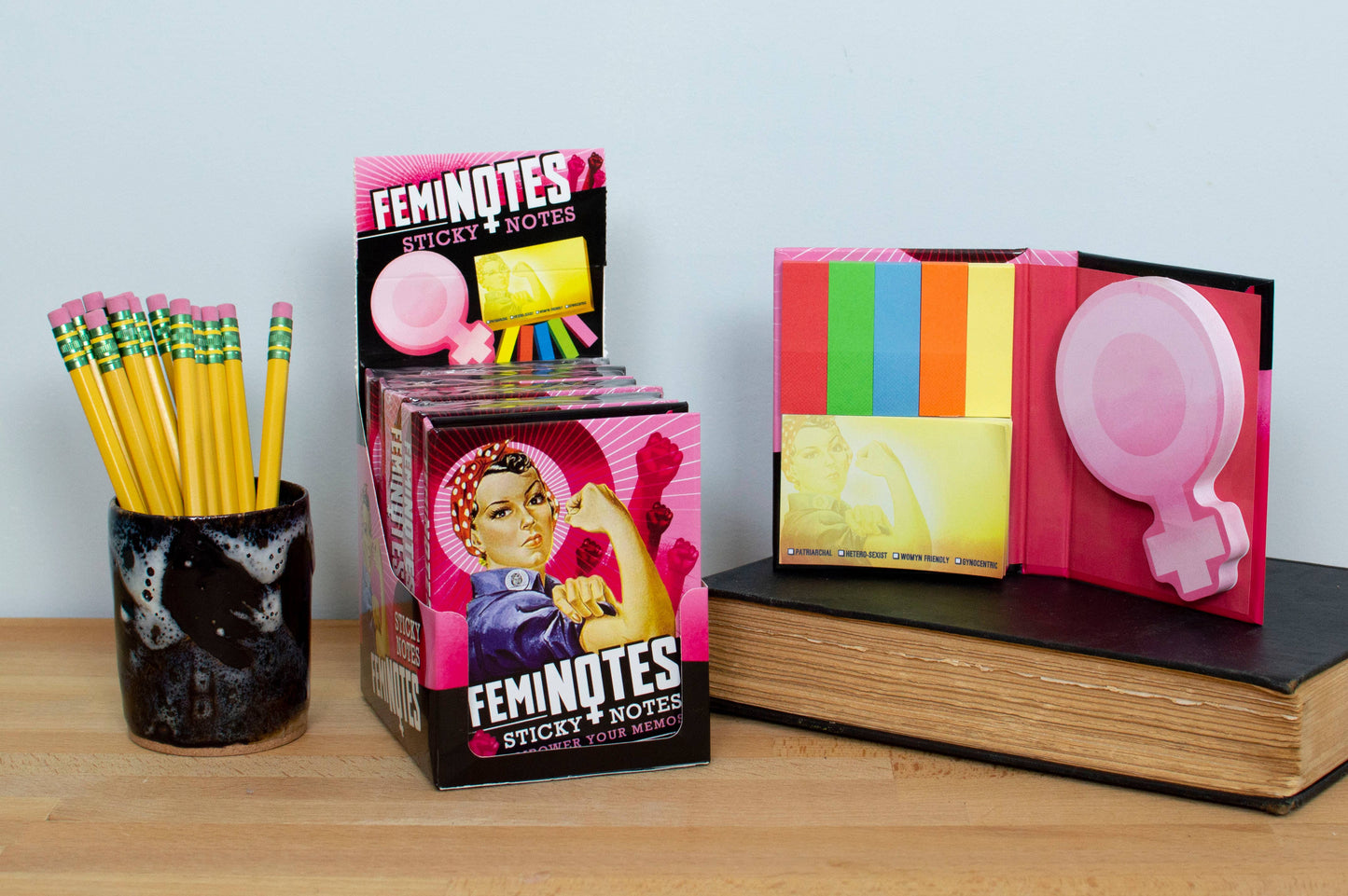 FemiNotes Sticky Notes display with assorted shapes and colors, perfect for stationery stores, featuring over 300 sticky notes per booklet.