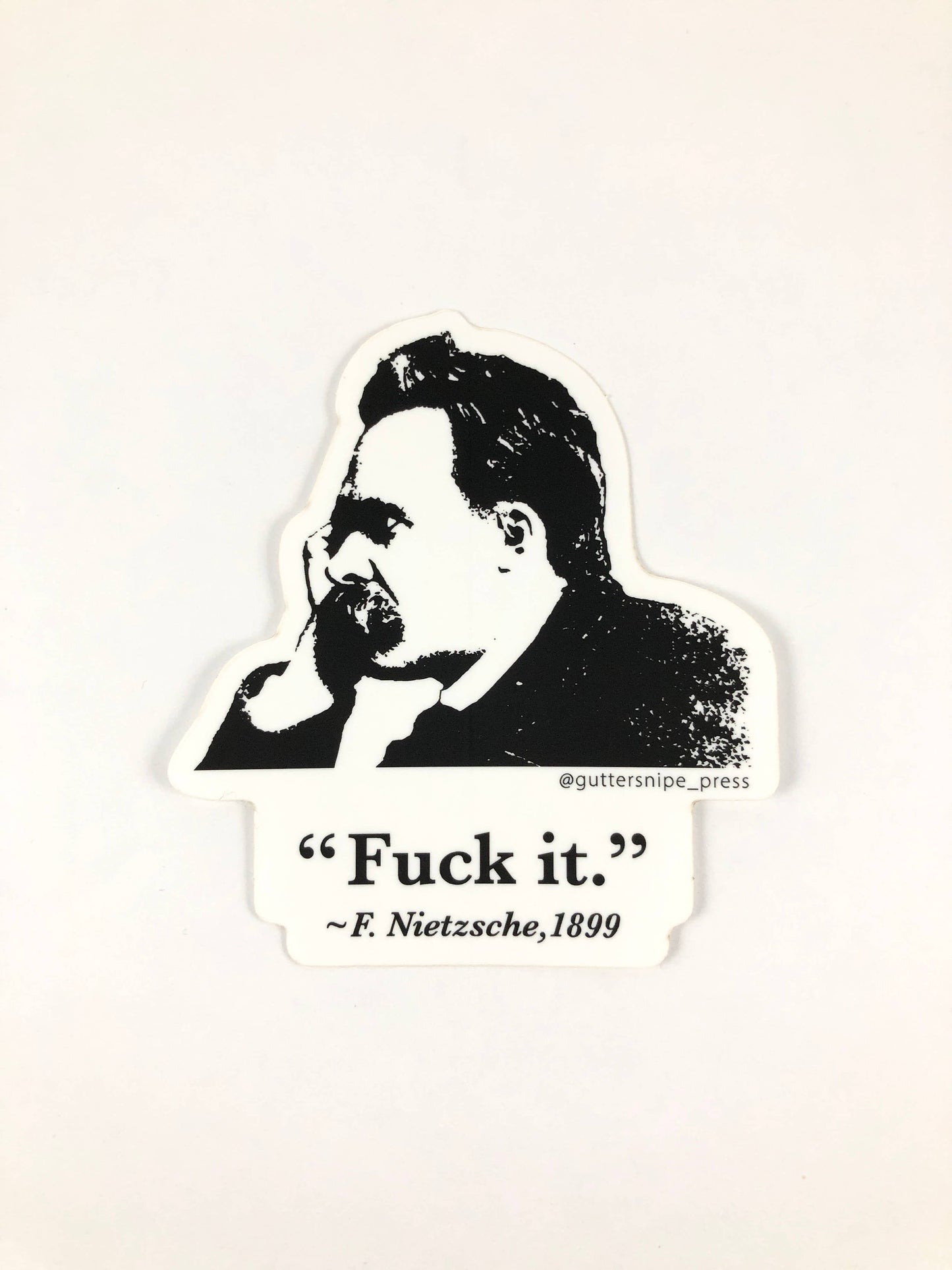 Nietzsche Fuck It Sticker, vinyl, 3x3.5 inches, indoor/outdoor use, stationery store product by Guttersnipe Press.