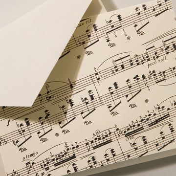 Sheet Music Notes on Ecru Kid Finish Paper