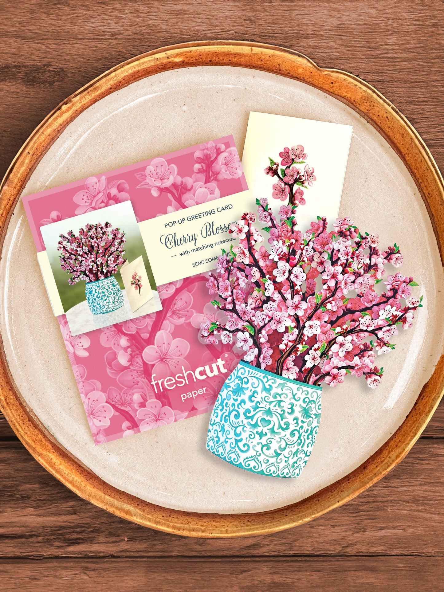 Mini Cherry Blossom Pop-up Greeting Card from FreshCut Paper displayed with notecard, perfect gift, available at stationery store.