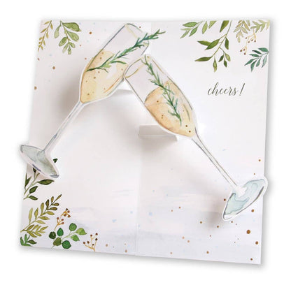 Champagne Toast Pop-Up Card with clinking glasses and foliage, from a stationery store, featuring champagne gold foil. Size: 4" x 8".