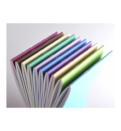 Assorted Clairefontaine CrokBook Sketchbooks in vibrant colors, perfect for sketching, available at stationery stores, pack of 10.