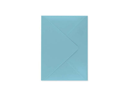 Dark teal envelope for Balloons Celebrate Die-Cut Greeting Card, available at stationery store, complements the full-color card design.