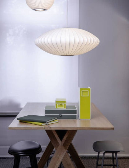 Modern office with Heritage Line Business Card Box and stationery on wooden desk.