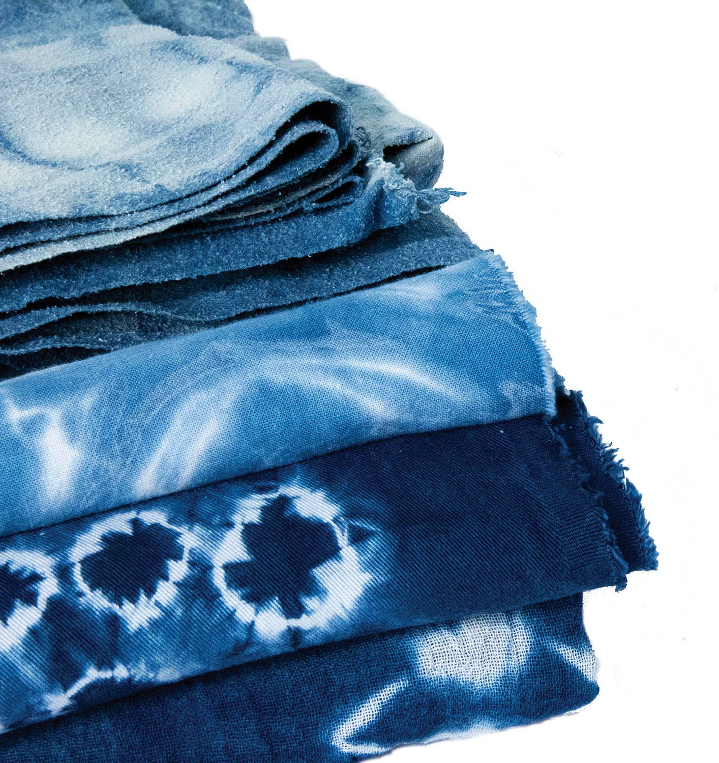 Indigo Tie Dye Kit fabrics showcasing ancient indigo dyeing, perfect for home dyers, available at your local stationery store.