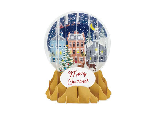 Village Glow Pop-Up Snow Globe Christmas Card with Merry Christmas message, available at stationery stores.