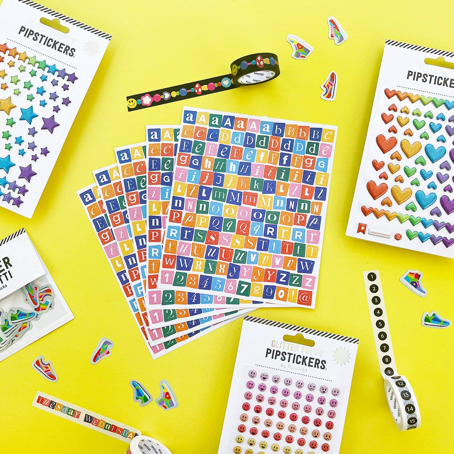 Colorful Mix & Mingle Big Alphabet stickers (5ct) on a yellow background, available at Pipsticks stationery store.