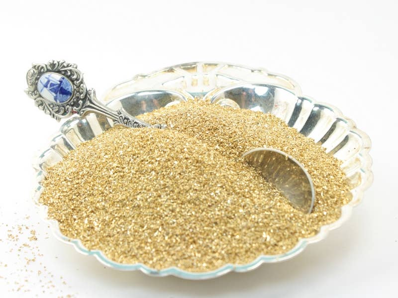 Gold Glass - Sparkly German Glass Glitter in decorative dish, fine 90 grit for crafts, available at stationery store.