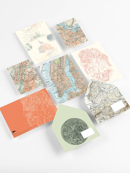 Historical Maps Correspondence Set with vintage map designs, stationery store item showcasing writing paper, envelopes, and greeting cards.