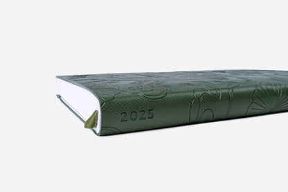 Weekly 2025 Planner Year of the Snake Jade from Stationery Store, featuring embossed green cover and elegant design for goal-setting.